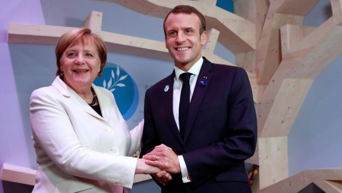 macron-et-merkel-sommet-pour-la-paix-à-Paris Forum sur la paix, Macron, Merkel et Gutteres plaident pour le multilatéralisme