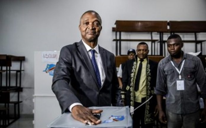 Le dauphin du président congolais Kabila, Emmanuel Ramazani Shadary vote le 30 décemre 2018 à Kinshasa / AFP le-dauphin-de-kabila-candidat-presidentiel-decembre-2018 Présidentielle en RDC : 