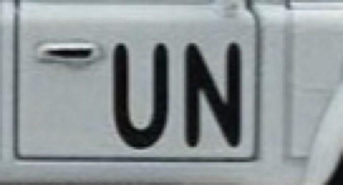 logo-des-nations-unies-à-côté-dun-blindé-de-la-minusca-à-Bangui Préavis de grève des employés civils de la Minusca.