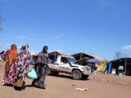 Sikikédé un jeune voleur capturé la main dans le sac après le vol des 5 sacs de sucre sur le marché de Ndah