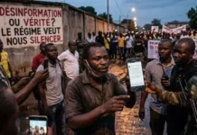 Désinformation ou vérité qui fâche ? Le régime de Bangui part en guerre contre la réalité des réseaux sociaux Image d'illustration génére par IA de la chasse aux réseaux sociaux annoncée par le Dictateur de Bangui Faustin Archange Touadera